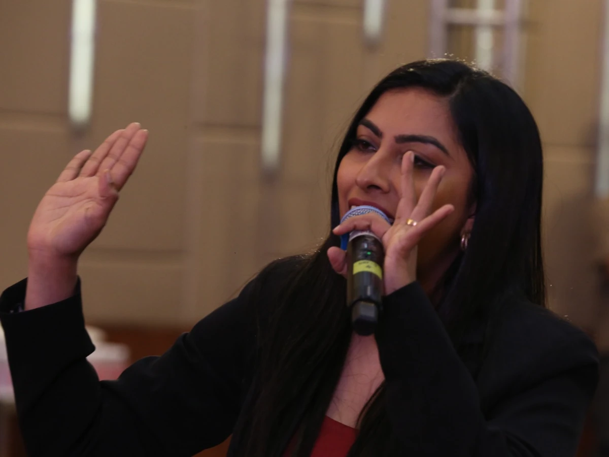 MC Raina Dsouza stage anchoring high-energy awards gala